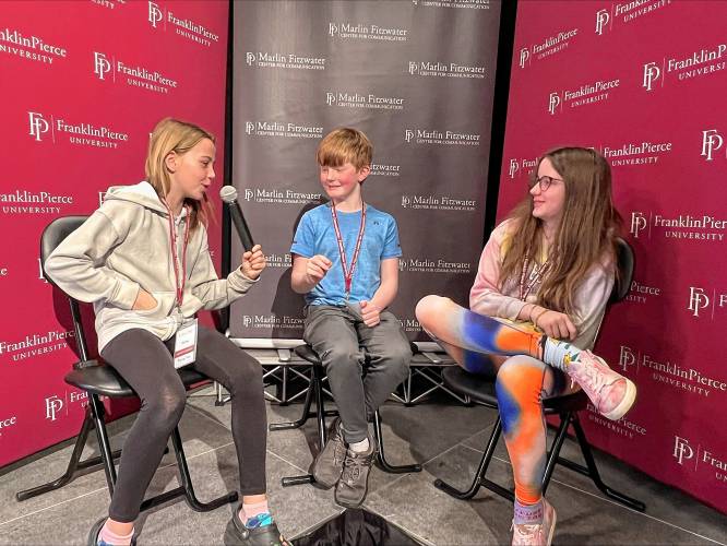 Rindge Memorial School students visit the Franklin Pierce University Fitzwater Center as part of a partnership between the schools to provide mentors for young writing students.