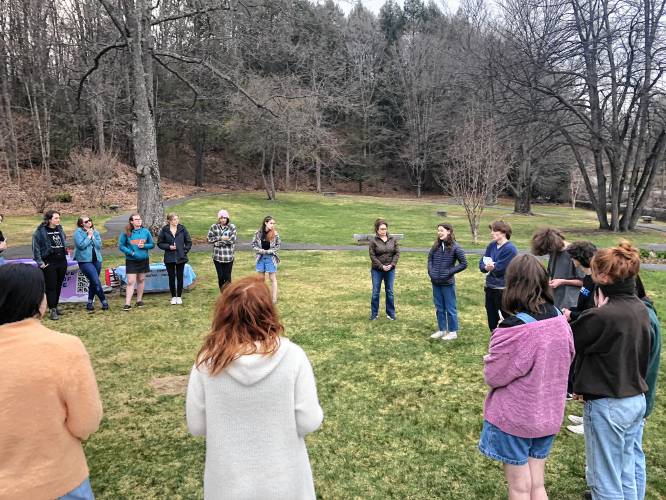 Attendees gather in a circle to talk about combatting sexual violence at the 2022 ESVOC April event.
