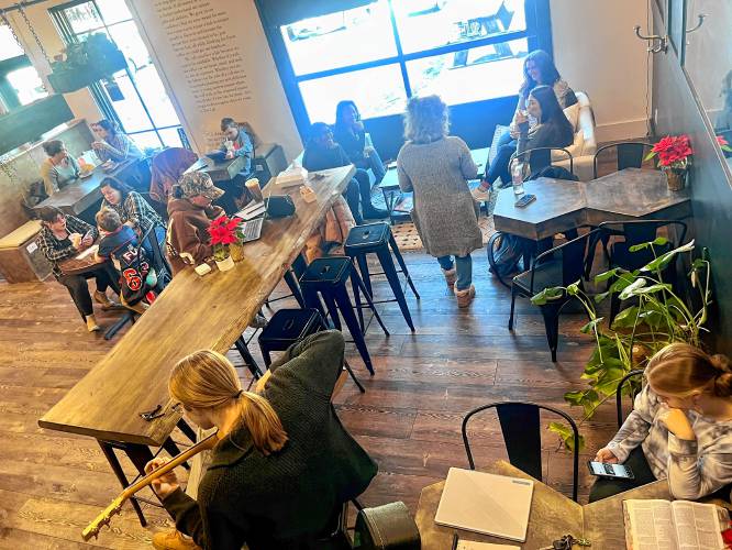 The interior of Identity Coffee Lab in Rindge, which will remain open after owners Britney and Jonathan Cashman had announced in December that it was going to close.
