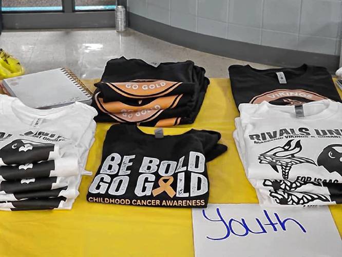 T-shirts for the “Go Gold” fundraising campaign.