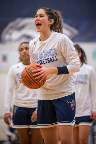 Sera Hodgson keeps it lively pregame before the University of Maine plays UNH Jan. 11.