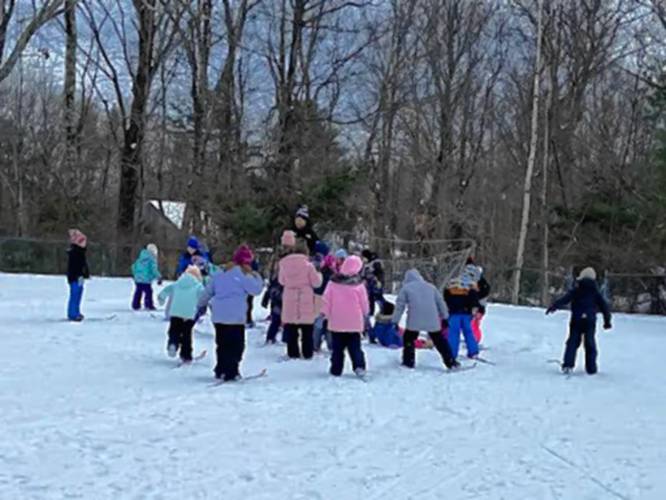 Dublin Consolidated students learn how to cross-country ski using one ski during their lesson with Dublin School Headmaster Brad Bates and Nordic ski coach Lindsay Matterson. 